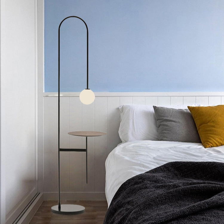 Sleek Arc Floor Lamp with Orb Shade - A Modern Minimalist Statement