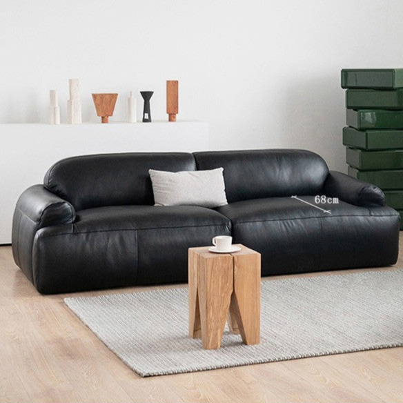 Modern Leather Sofa with Oversized Cushions and Sleek Design