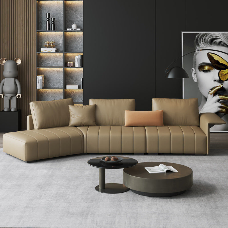 Modern Leather Sectional Sofa with Curved Design and Stylish Stitching