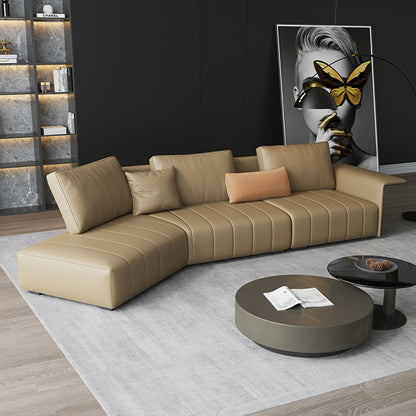 Modern Leather Sectional Sofa with Curved Design and Stylish Stitching