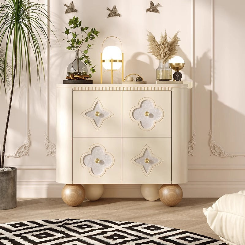 Curved Cabinet with Intricate Carvings and Gold Accents